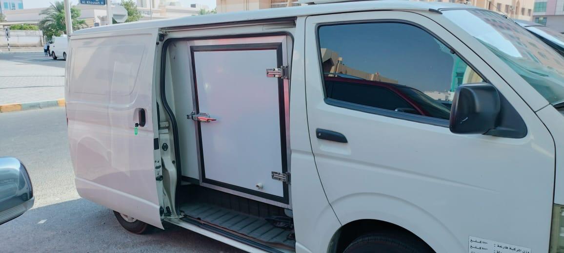 Fast chiller van parked indoors, perfect for temperature-sensitive deliveries across Dubai, Abu Dhabi, Ajman, and Sharjah with reliable refrigerated truck rental services.